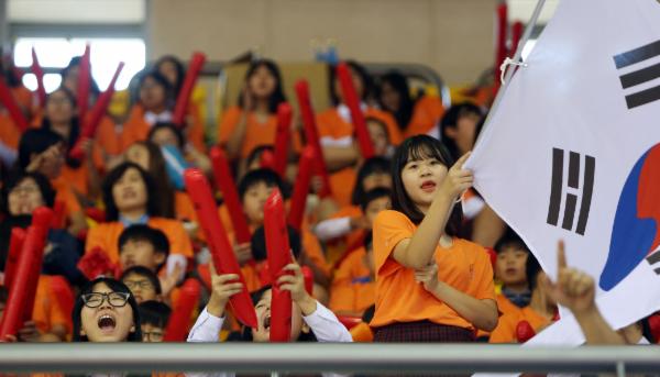 The Orange Colored Cheering Encouraged Athletes in WG